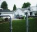 House protected by a fence