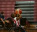 Boys playing basketball in wheelchairs